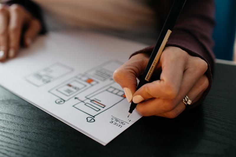 Wireframe sketches for a freelancer landing page conversion layout