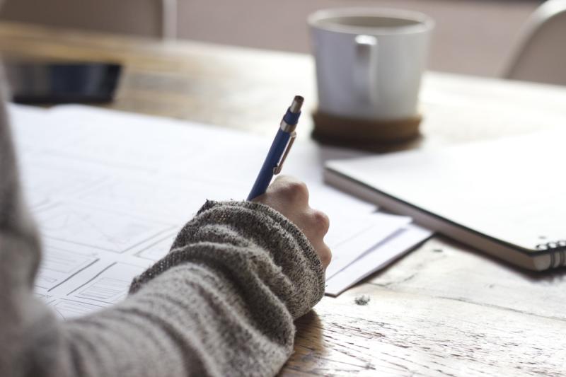 Morning routine setup with planner, coffee, and an organized workspace